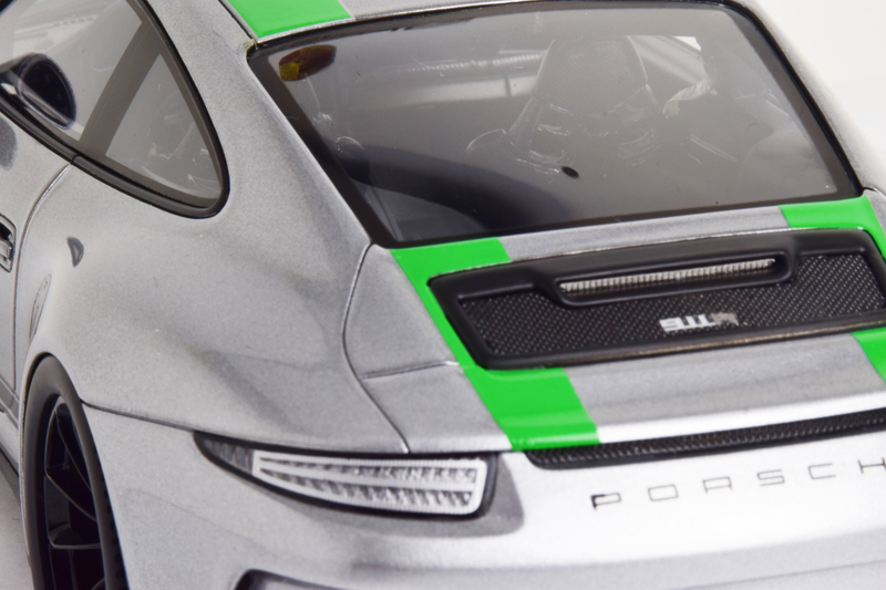 Wing deploys at speed, but 911R gets bespoke engine cover.